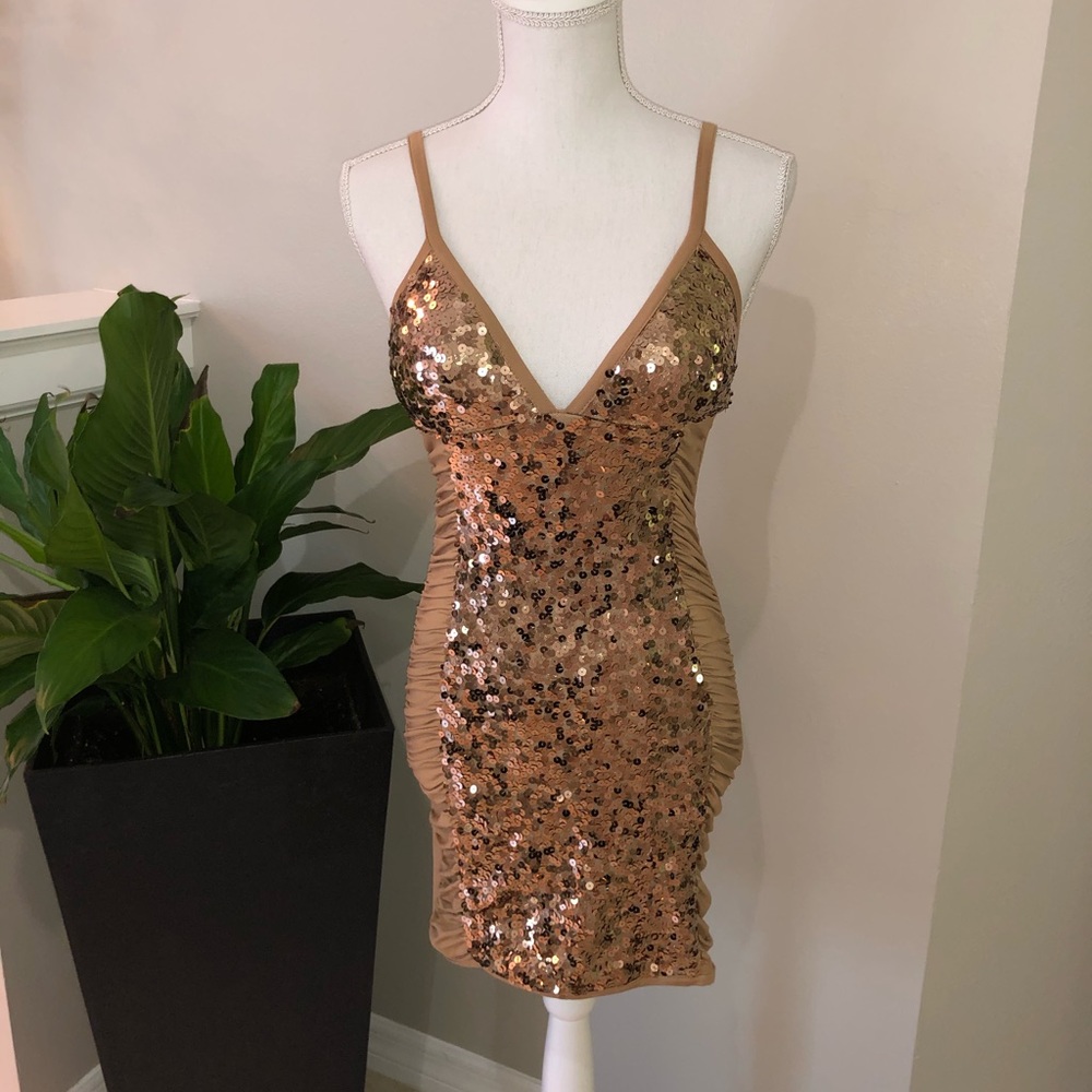 DONATING SOON Wetseal sequin ruched mini dress  size small.
